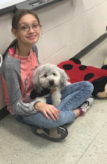 student with bear